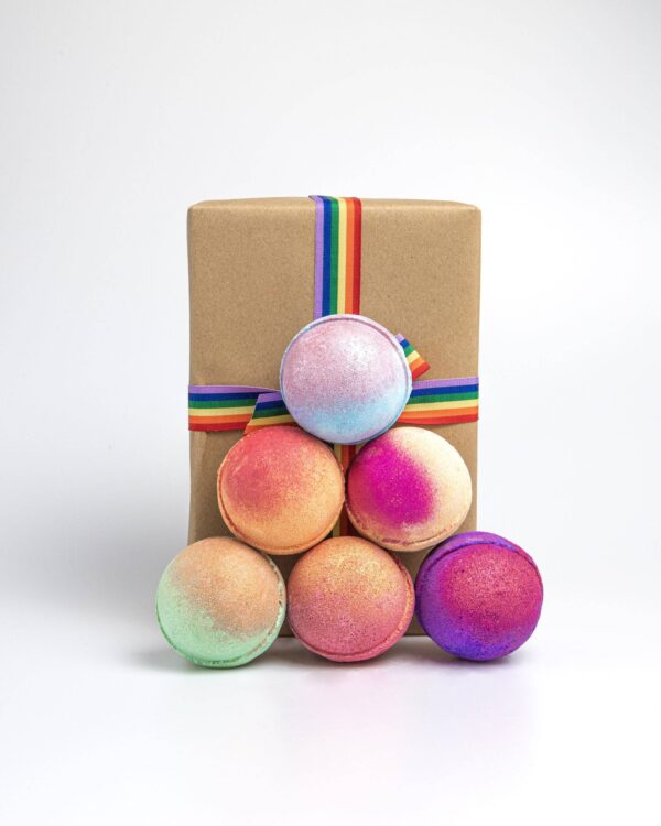 Indulge in a burst of vibrant colours and tantalizing scents with our Rainbow Bath Bomb Gift Set. This delightful collection features five exquisite bath bombs, each designed to transport you to a world of relaxation and luxury. Immerse yourself in the blissful aromas and vibrant hues, creating a truly enchanting bathing experience.