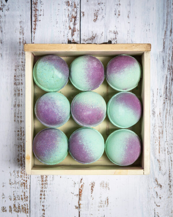 Our Cherry Apple, Pink Lemonade & Midnight Pomegranate Set. For a vibrant & gorgeous bath bomb, our Cherry Apple Bath Bomb is the go-to. This bath bomb adds a fantastic green with a beautiful magenta shimmer to your bath as well as a delightful cherry and sweet apple scent.